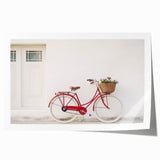 Vintage-style bicycle with floral basket on a rolled canvas print, suited for dining room or bathroom decor.
