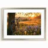 Abstract art print of a stylized bicycle in silver and gray tones on a framed canvas, ideal for dining room decor.