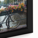 Extra large framed canvas featuring a black bicycle on a textured, colorful abstract background, ideal for living room decor.
