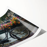 Extra large wall art featuring a line art bicycle on a rolled print.
