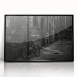 Large abstract wall art featuring a bicycle design in black and white tones on a framed acrylic.