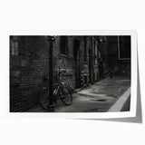 Vintage-style bicycle print in muted earth tones on rolled canvas, ideal for art wall dining room.