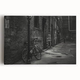 Black and white photo of a vintage bicycle on stretched canvas, ideal for kitchen wall art.