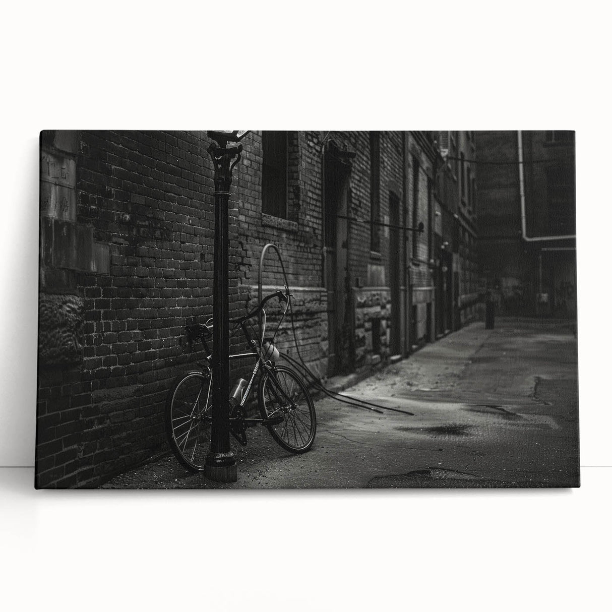 Black and white photo of a vintage bicycle on stretched canvas, ideal for kitchen wall art or bedroom decor.