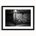 Extra large abstract art print featuring a textured, colorful bicycle design on a black framed canvas.