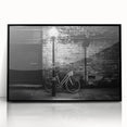 Large abstract wall art featuring a bicycle design in black and white tones on a framed acrylic.