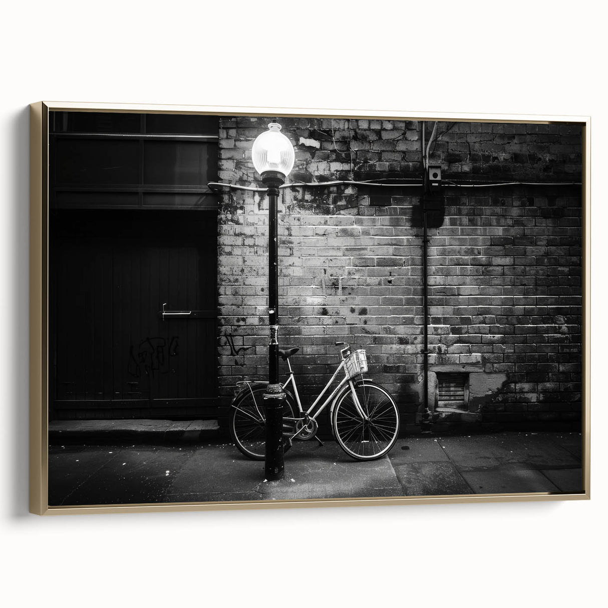 Framed canvas of a vintage bicycle in black and gold tones, ideal for bedroom wall art.
