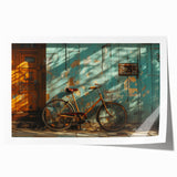 Vintage bicycle with floral basket on a rolled print, featuring muted earth tones, ideal for art wall dining room.