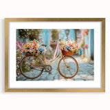 Textured art print of an abstract bicycle design in muted gold and black tones on a framed canvas.