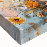 Large art of a black and white bicycle on a stretched canvas, ideal for bedroom wall placement.