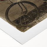 Art deco poster of a vintage bicycle in muted sepia tones, printed on rolled canvas, suitable for dining room decor.