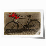 Rolled print of a vintage bicycle with floral accents in soft pastel shades, suitable for dining room or bathroom decor.