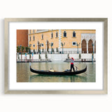 Abstract art print of a silver-framed gondola on water in muted blue and gray, ideal for dining room decor.