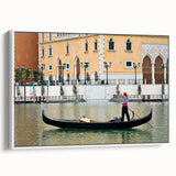 Framed canvas depicting a vintage-style gondola on a serene waterway, in muted black and gray tones.