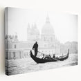 A gondola on calm water depicted in muted blue and gray tones on a stretched canvas, suitable for kitchen wall art.