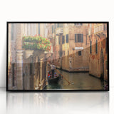 Large abstract wall art of a gondola on water, in muted black and gray tones, framed in black acrylic.