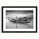 Extra large abstract art print of a textured gondola on water, in muted blue and gray tones, framed in black.