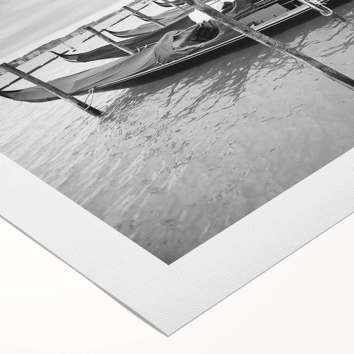 Art deco poster of a gondola on a calm waterway, rendered in muted blues and grays on rolled canvas.