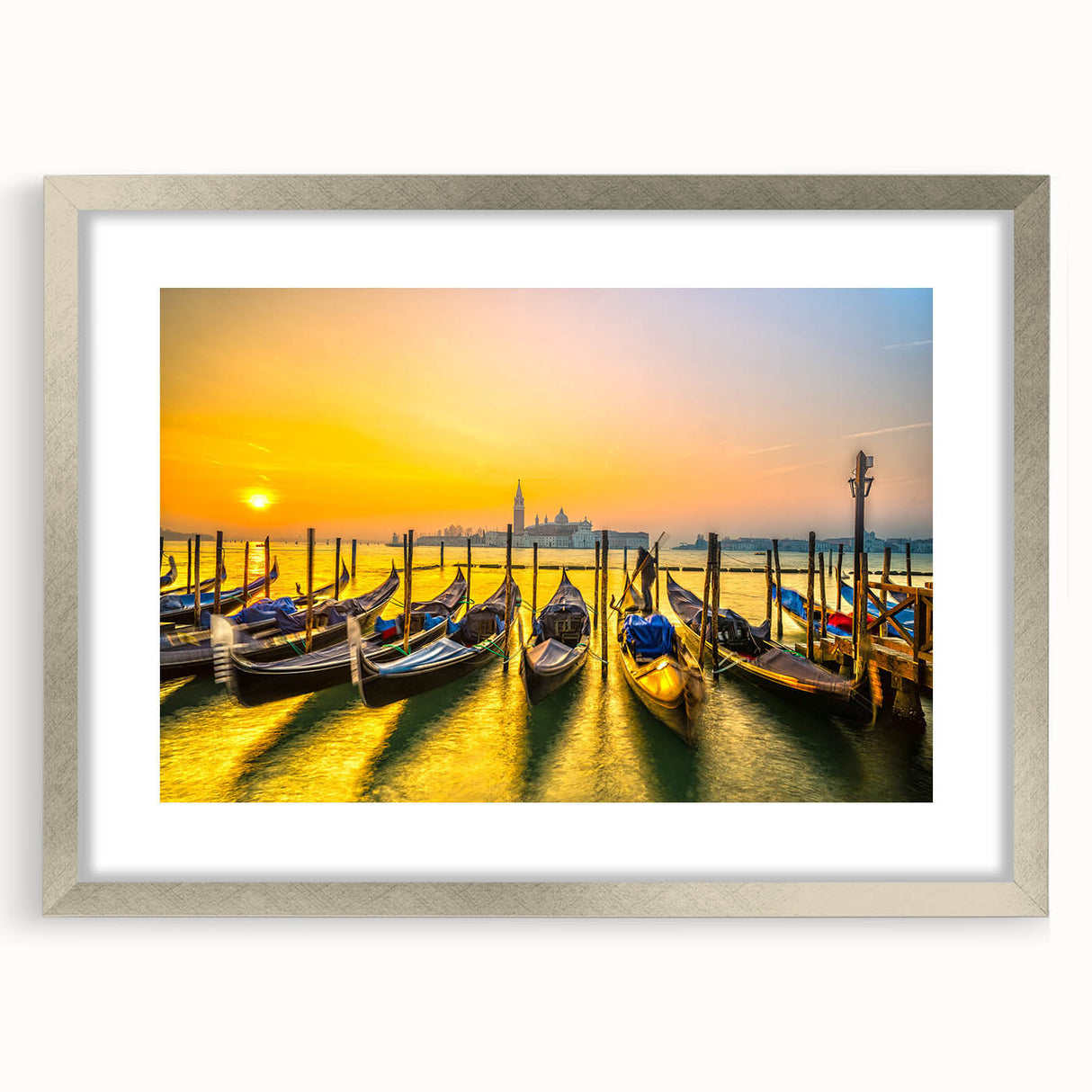 Abstract art print of a stylized gondola in muted blue and gray tones on a silver-framed canvas.