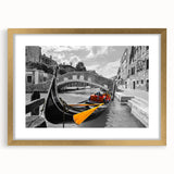 Textured art print of an abstract gondola in muted gold and blue hues on a framed canvas, suitable for bedroom decor.