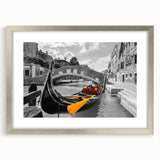 Abstract art print of a stylized gondola in blue and silver tones on a framed canvas, ideal for dining room decor.