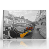 Framed acrylic print of a gondola on water, featuring muted blue and gray tones, perfect for modern art wall decor.