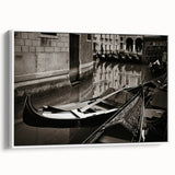Framed canvas featuring a vintage-style gondola on a muted black and grey landscape, ideal for bedroom wall art.
