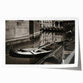 Rolled print of a Venetian gondola in muted watercolor tones, suitable for dining room or bathroom decor.