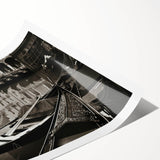 Extra large wall art depicting a gondola on a canal, rendered in muted earth tones on a rolled canvas.