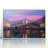 Framed acrylic print of a mid-century modernist gondola on a canal, using muted pastel shades.