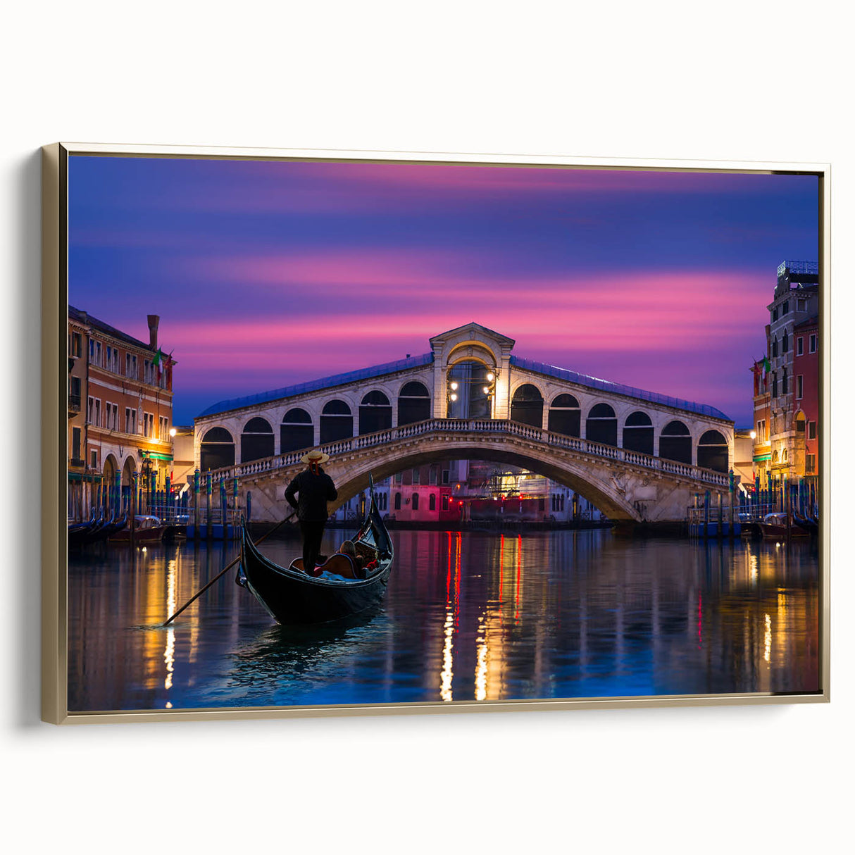 Framed canvas of a vintage-style landscape painting featuring a gondola on water, with a black and colorful art palette.