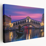 Gondola on a serene canal, rendered in soft blues and grays on a stretched canvas, suitable for kitchen wall art.