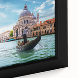 Extra large framed canvas depicting a black gondola on vibrant, textured blue water, ideal for living room decor.