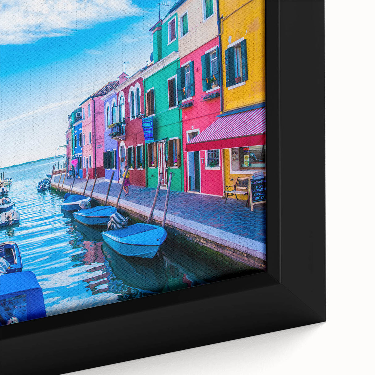 Framed canvas featuring a close-up of a black gondola on vibrant blue water, ideal for extra large living room wall decor.