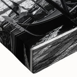 Black and white photo of a gondola on calm waters, printed on large stretched canvas, suitable for bedroom wall decor.