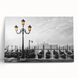 Black and white photo of a gondola on a canal, printed on large stretched canvas.