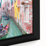 Extra large framed canvas featuring a black gondola on colorful, textured water, ideal for living room decor.