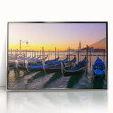 Art deco style poster of a silver-framed acrylic print featuring a gondola on water, in muted blue and gray tones.