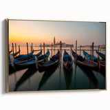 Framed canvas featuring a vintage-style gondola on a canal, rendered in colorful art with prominent black and gold tones.
