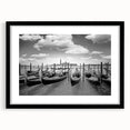 Colorful abstract art print of a gondola on textured canvas, framed in black, suitable for large living room walls.