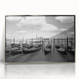 Art deco style poster of a silver-framed acrylic print depicting a gondola on water, in muted blue and gray tones.