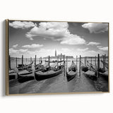Framed canvas depicting a vintage gondola on a colorful, abstract water landscape.