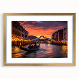 Textured art print of an abstract gondola on water in muted blue and gold tones, framed in gold, suitable for bedroom decor.