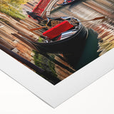 Art deco poster of a gondola on a tranquil canal, rendered in muted sepia tones on rolled canvas.