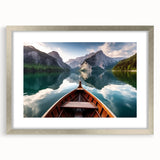 Abstract art print of rowboats on water in muted blue and gray tones, framed in silver, suitable for dining room decor.