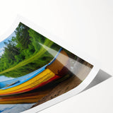 Extra large wall art featuring a rowboat on calm waters, rendered in soft blue and gray tones on a rolled print.