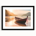 Abstract art print of a rowboat, featuring a textured mix of vibrant blues and greens on a large canvas.