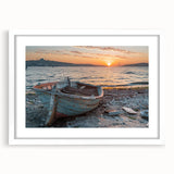 Abstract art print of a rowboat on textured canvas, using muted blues and grays, framed in white.