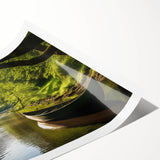 Extra large wall art featuring a rowboat on water, with muted earthy tones on a rolled print.