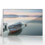 Mid-century modernist art depicting a rowboat on water, in muted blue and gray tones, framed acrylic.